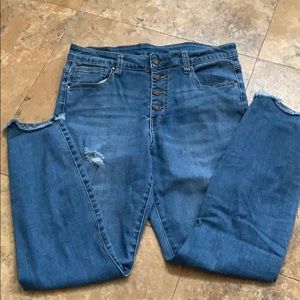 Buttonfly distressed jeans